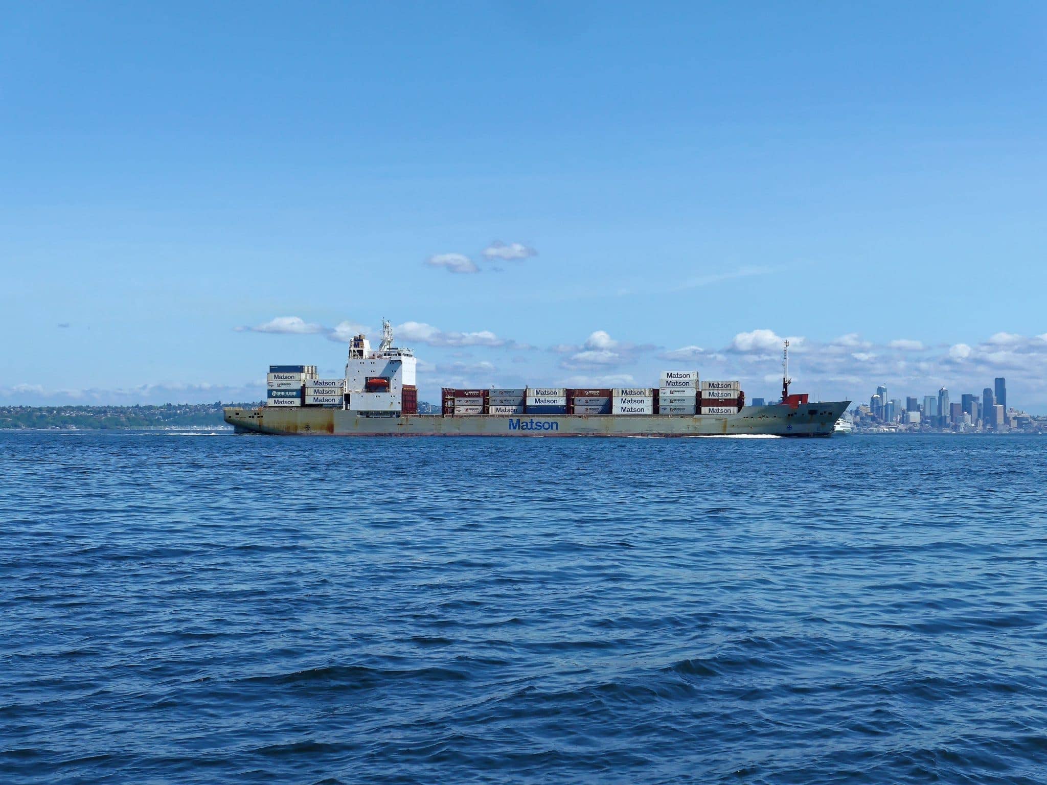 matson ship and seattle in background on way to winslow wharf marina